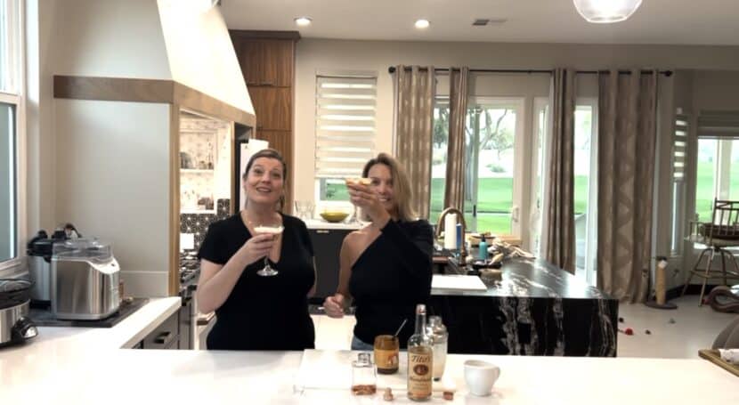 Helena and Robin toasting with caramel chai vodka martinis